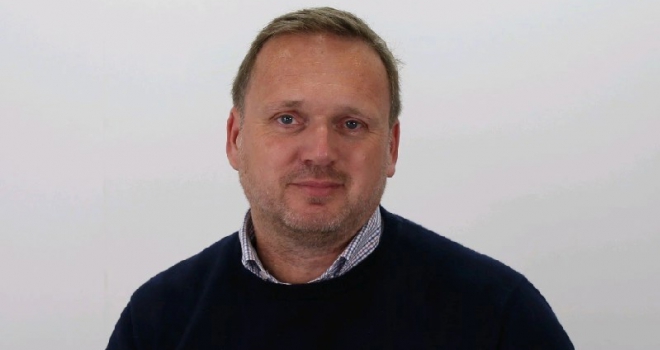 Jonathan Barrett, CEO of Comentis